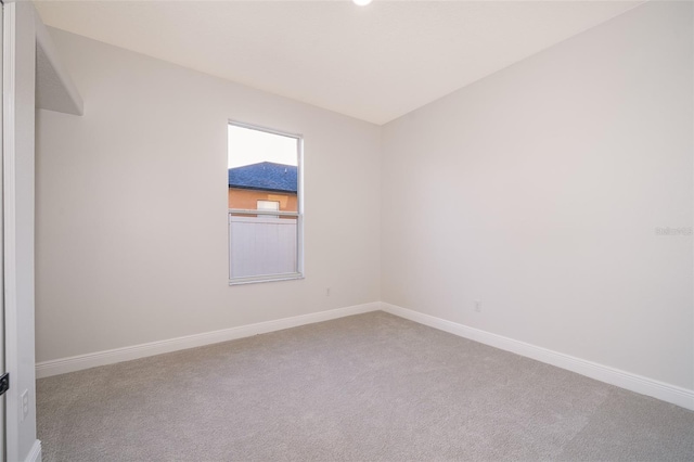 empty room featuring carpet floors