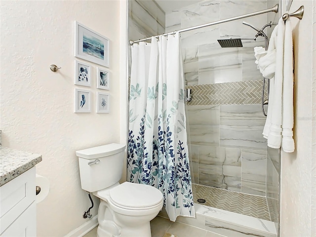 bathroom with vanity, toilet, tile patterned floors, and a shower with shower curtain