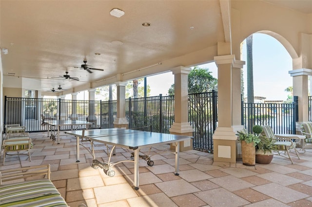 view of patio featuring ceiling fan