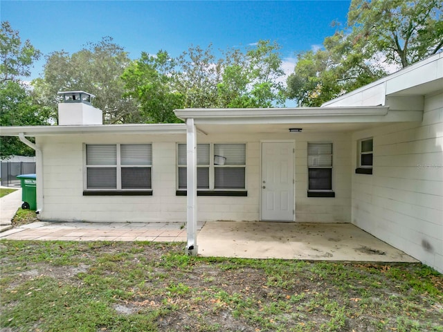 rear view of house featuring a patio area