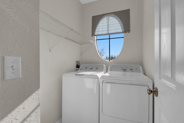 laundry area with washing machine and dryer