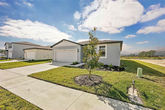 ranch-style home featuring a front yard and a garage