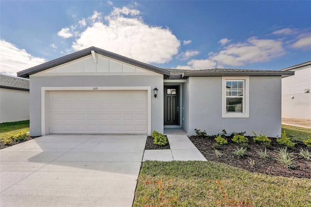 ranch-style house featuring a garage