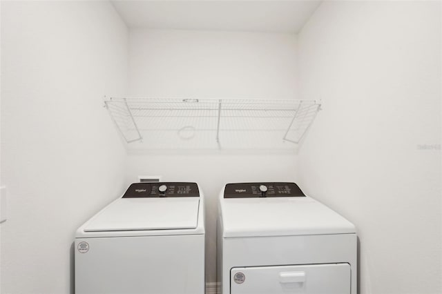 laundry area featuring washing machine and dryer