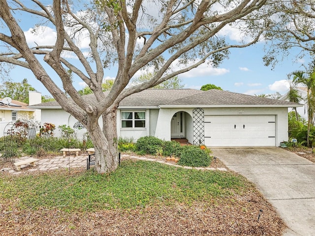 single story home with a garage