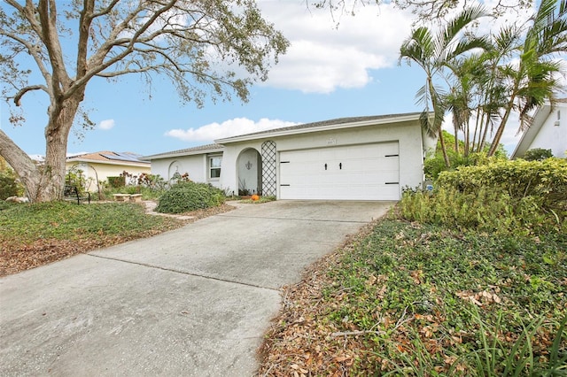 ranch-style home with a garage