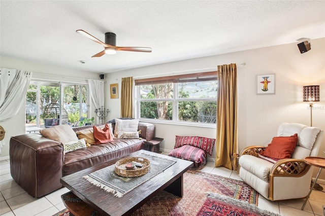 living room with light tile patterned flooring and a healthy amount of sunlight