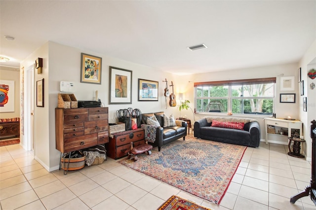 living room with light tile patterned floors