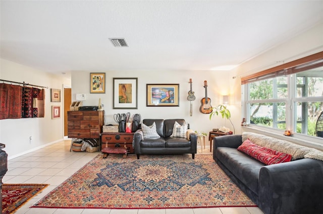 living room with light tile patterned flooring