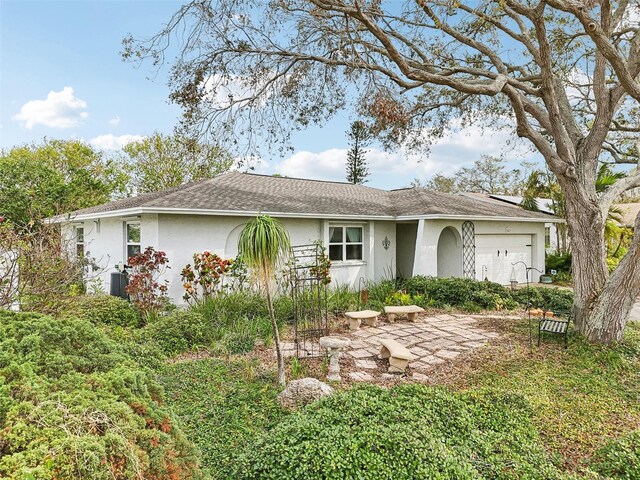 ranch-style house with a patio area