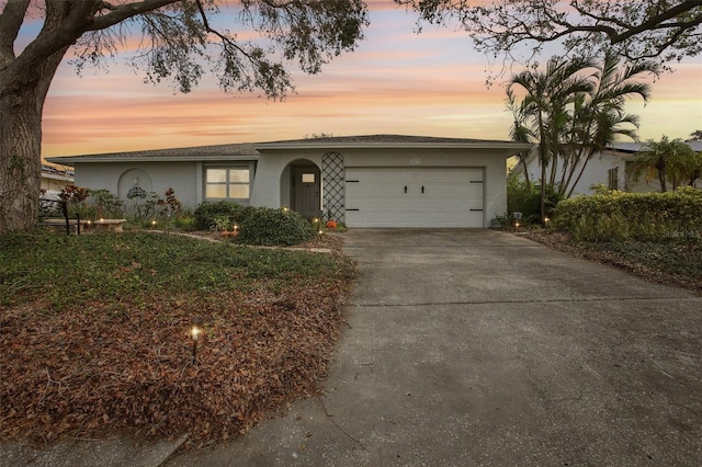 single story home with a garage