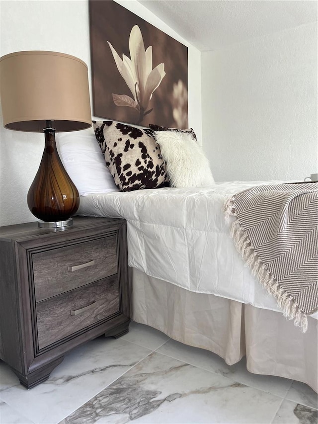 bedroom with a textured ceiling