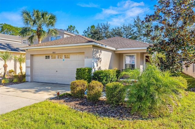 single story home featuring a garage