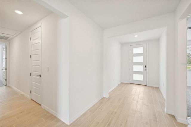 foyer entrance featuring light wood-type flooring