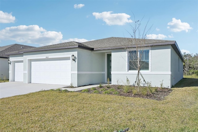 view of front of home featuring a front lawn and a garage