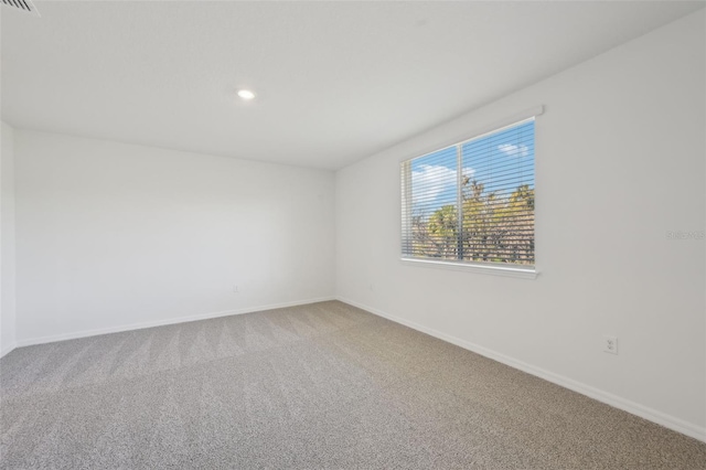 empty room featuring carpet floors