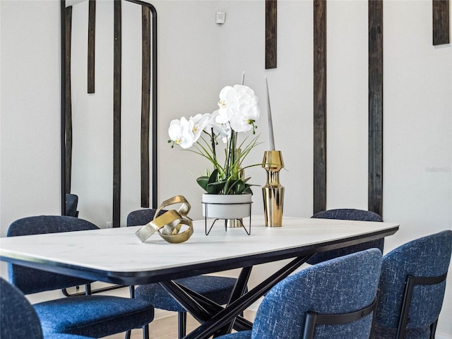 dining space featuring hardwood / wood-style flooring