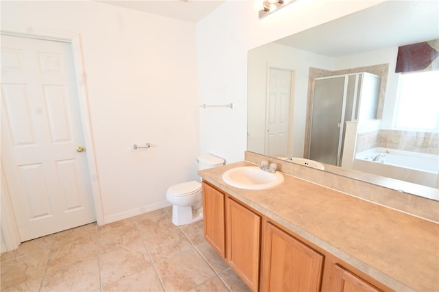 full bathroom featuring toilet, vanity, and independent shower and bath