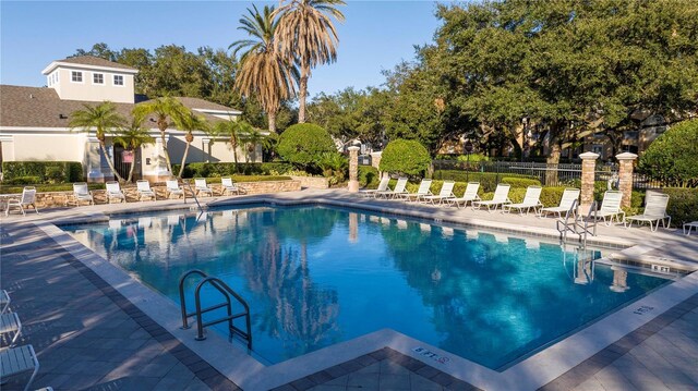 view of pool featuring a patio area