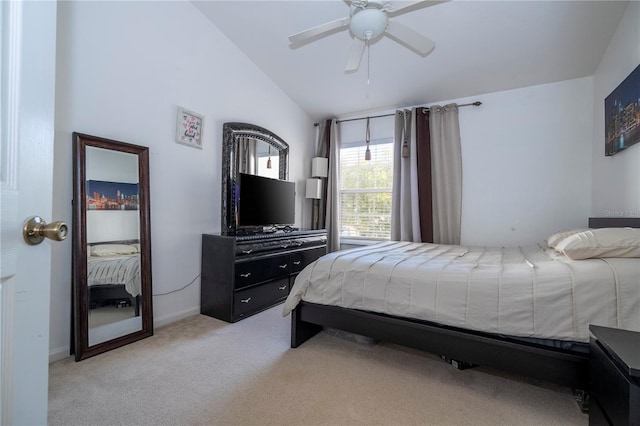 bedroom with light carpet, vaulted ceiling, and ceiling fan