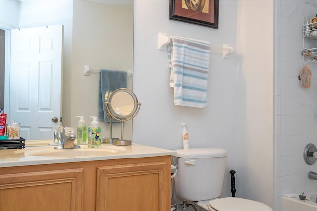 full bathroom with vanity, toilet, and tiled shower / bath combo