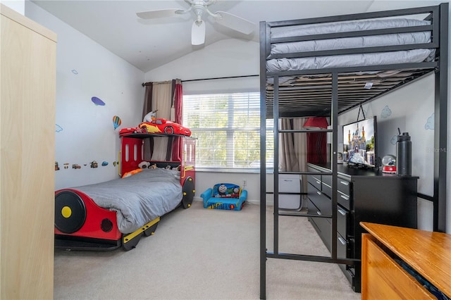 bedroom featuring ceiling fan, light colored carpet, and vaulted ceiling