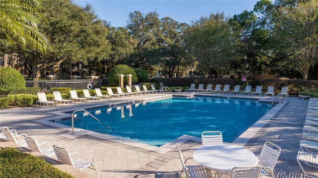 view of swimming pool featuring a patio area