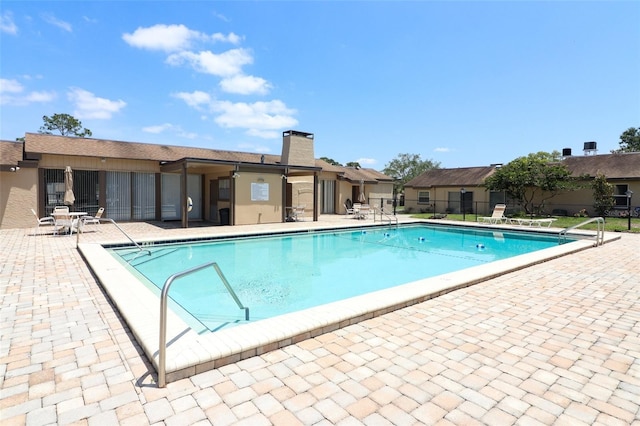 view of pool with a patio