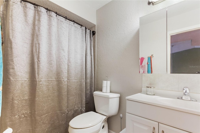 bathroom with toilet, decorative backsplash, vanity, and a shower with shower curtain