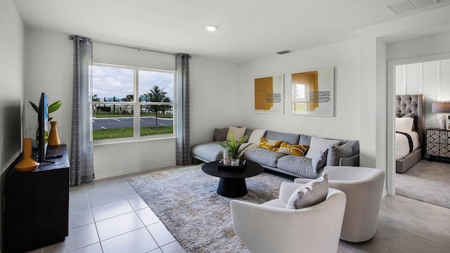 living room featuring light tile patterned floors