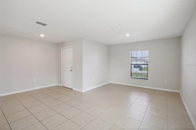 empty room featuring light tile patterned flooring