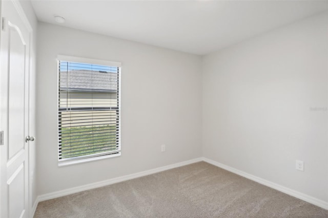 spare room with carpet flooring