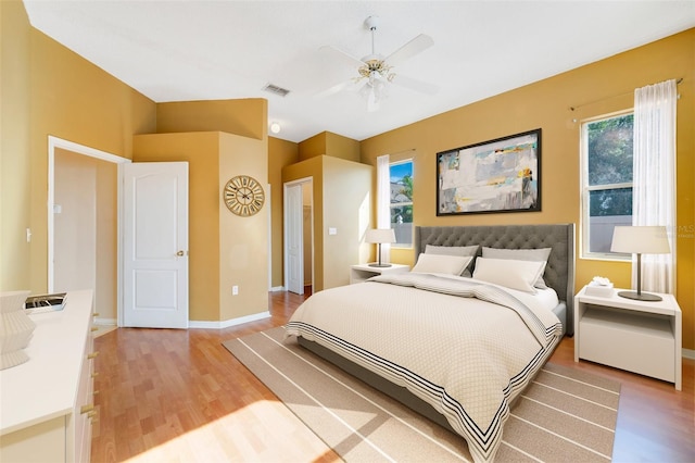 bedroom featuring hardwood / wood-style flooring and ceiling fan