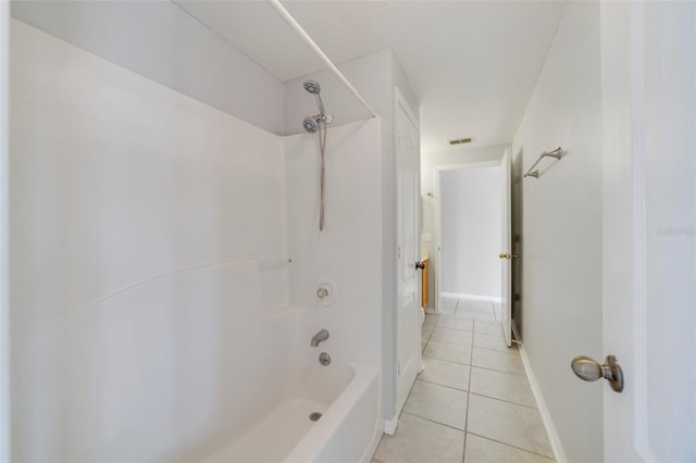 bathroom with  shower combination and tile patterned flooring