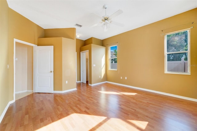 unfurnished room featuring ceiling fan and light hardwood / wood-style flooring