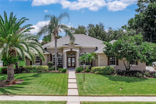 view of front of home with a front lawn