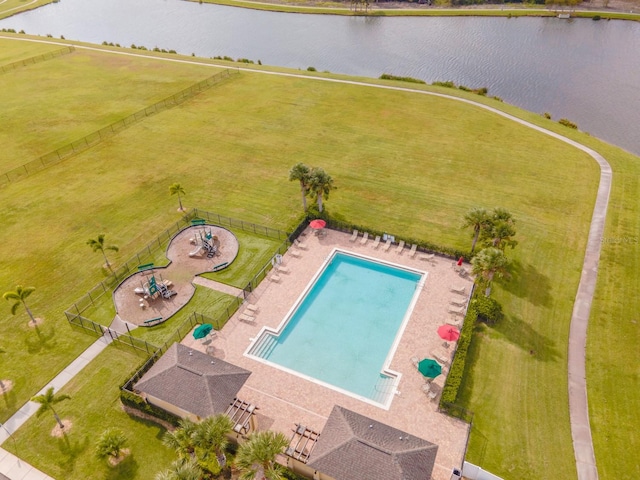 birds eye view of property with a water view