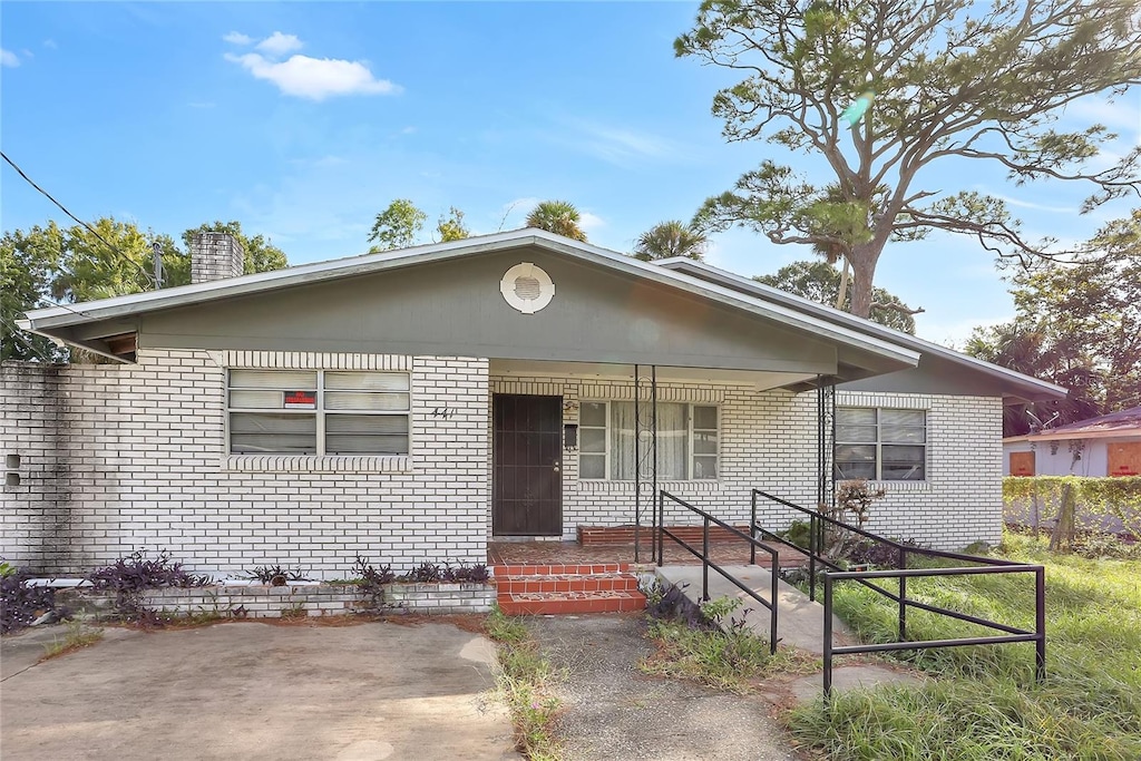 bungalow-style home with covered porch