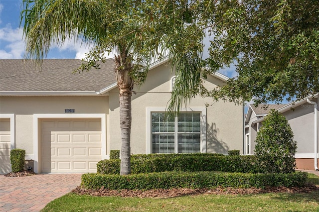 view of front of home featuring a garage