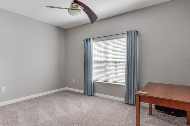 office space featuring carpet floors and ceiling fan