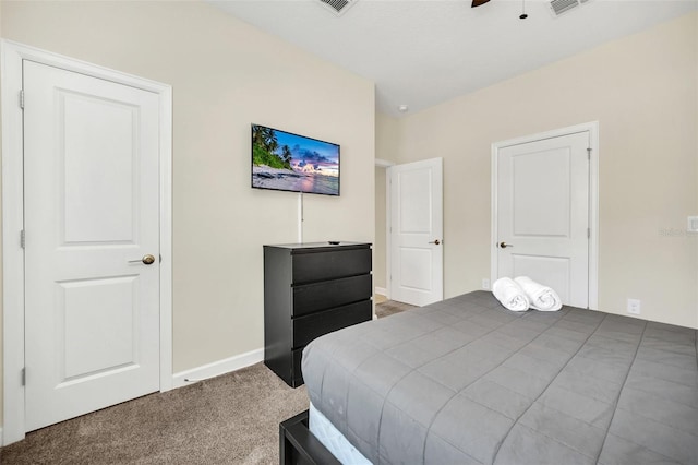 carpeted bedroom featuring ceiling fan