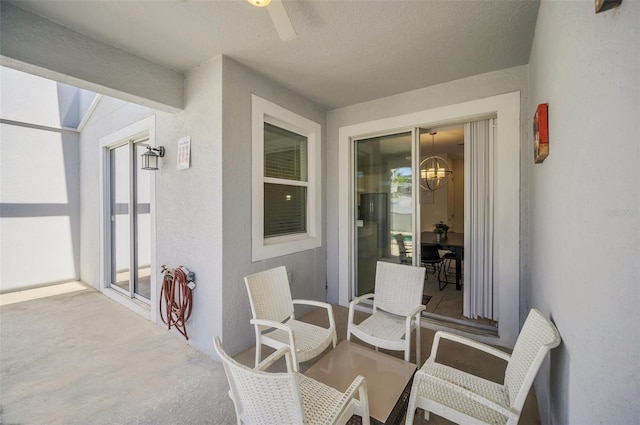 view of patio / terrace featuring ceiling fan