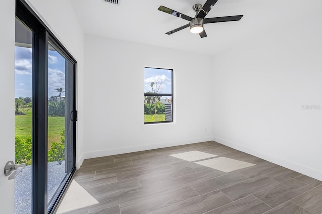 spare room with ceiling fan