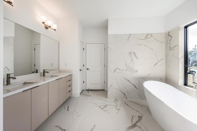 bathroom with vanity and a bathing tub