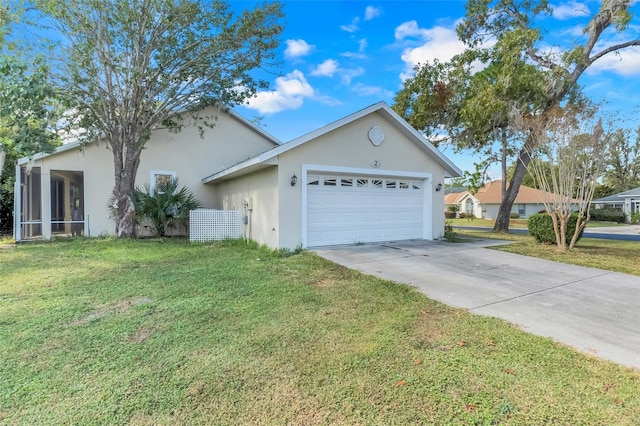 view of front facade featuring a front yard and a garage