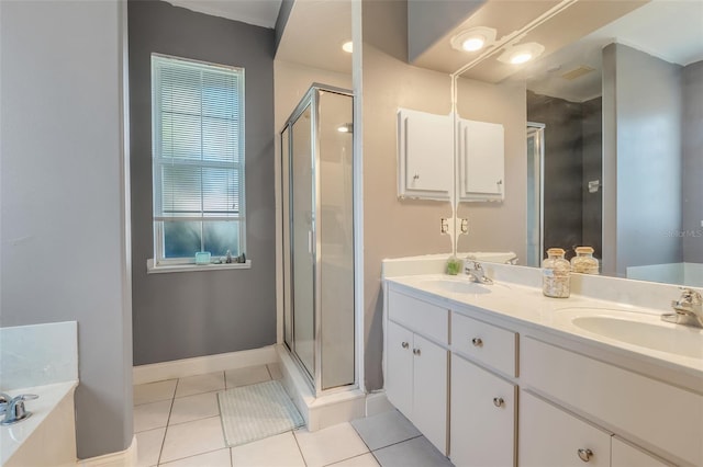 bathroom with vanity, separate shower and tub, and tile patterned flooring