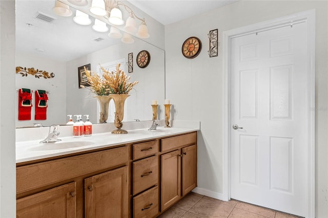 bathroom with vanity and tile patterned floors