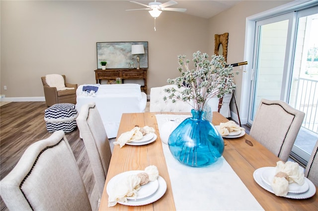 dining space featuring ceiling fan and hardwood / wood-style flooring