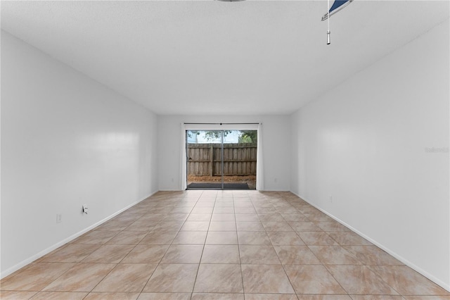 view of tiled spare room