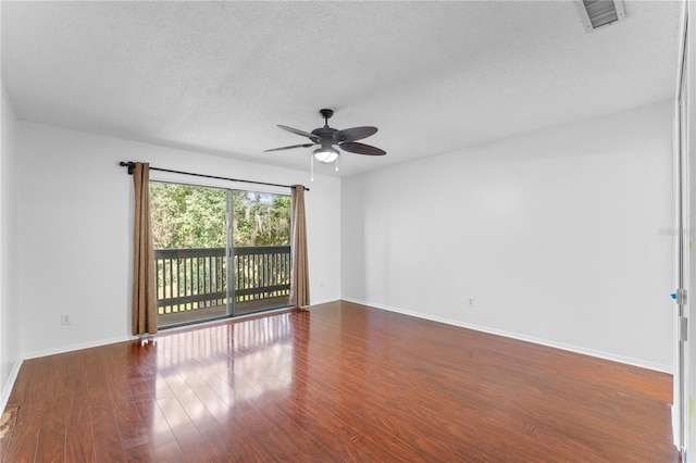 unfurnished room with wood-type flooring, a textured ceiling, and ceiling fan